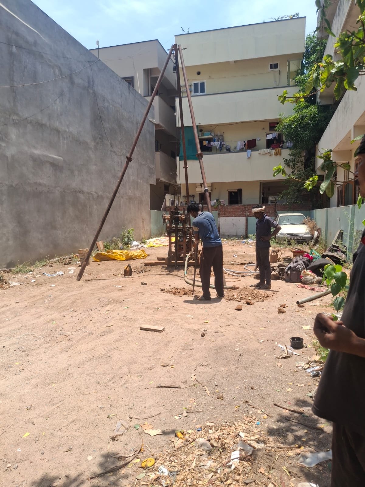 Geotechnical engineer conducting a borehole soil test at a construction site in Hyderabad